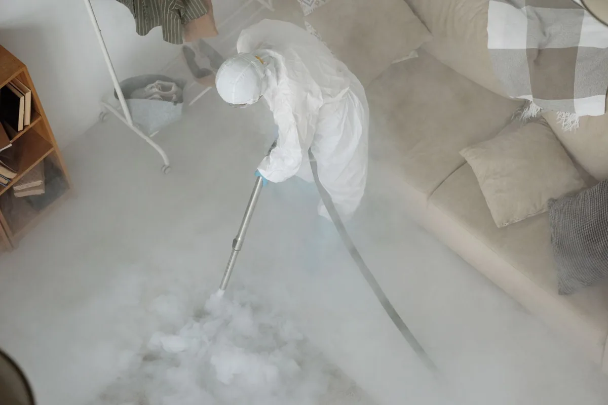 Biohazard cleanup technician in protective equipment, Wautoma, WI